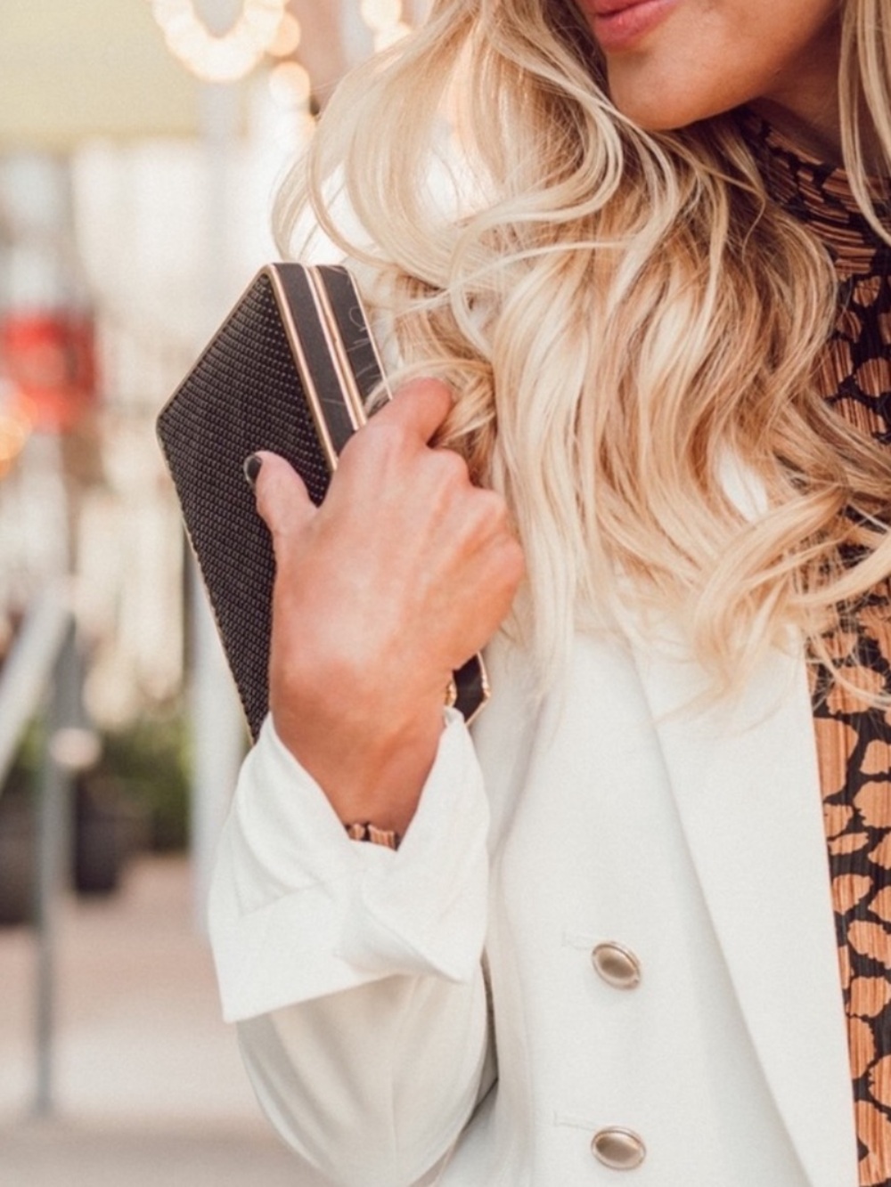 BCBGmaxazria black clutch with gold chain strap